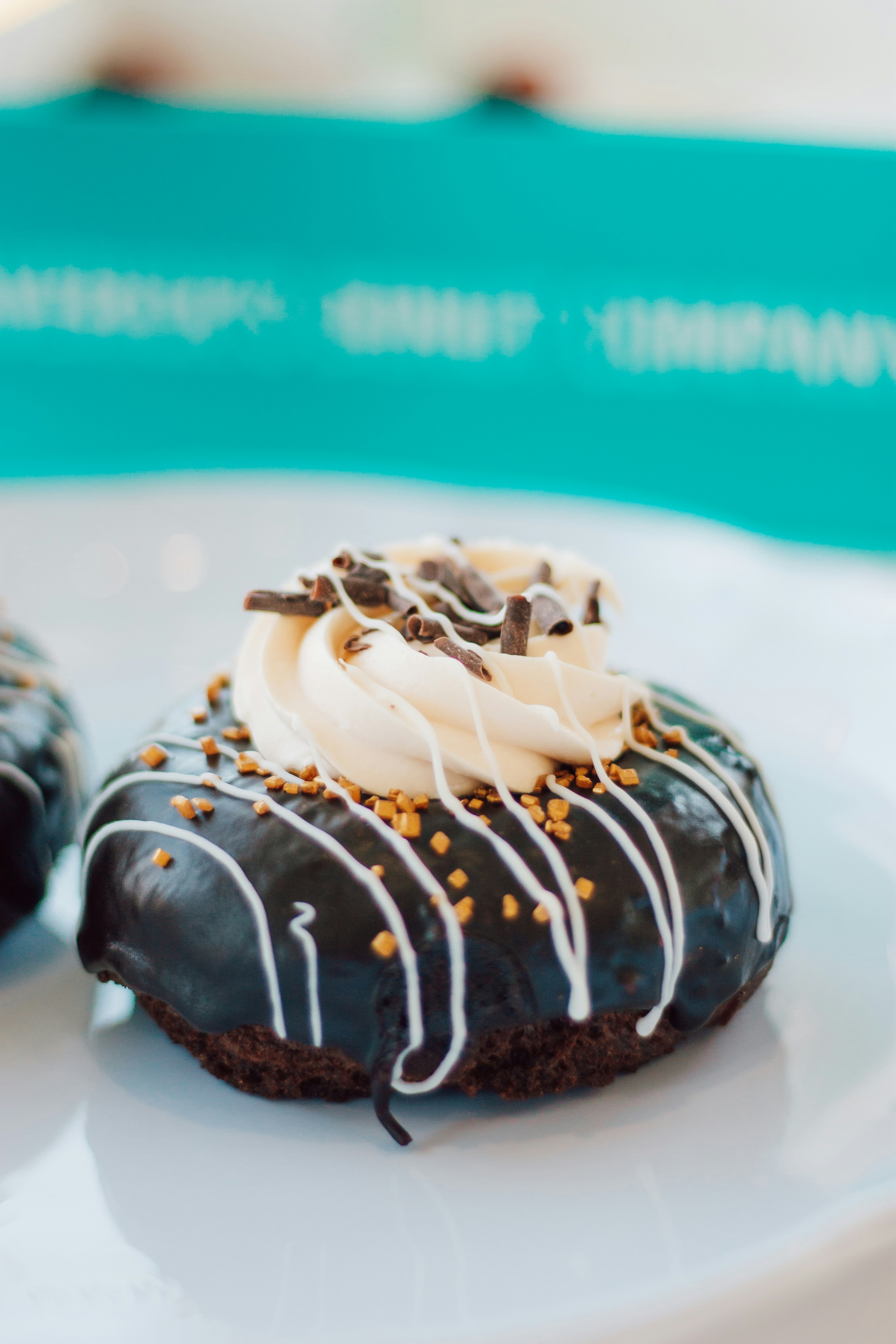 chocolate cupcake with white icing on top